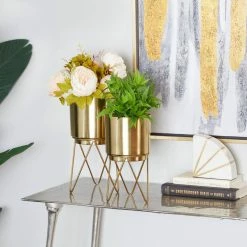 CosmoLiving by Cosmopolitan 12 in. x 6 in. Gold Metal Modern Planter (Set of 2) -Everbilt Sales Store gold cosmoliving by cosmopolitan plant pots 040010 31 1000