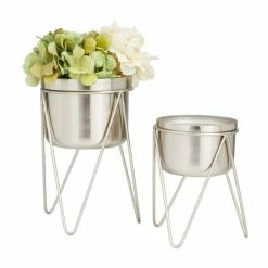 CosmoLiving by Cosmopolitan 7 in. x 10 in. Silver Metal Modern Planter(Set of 2)