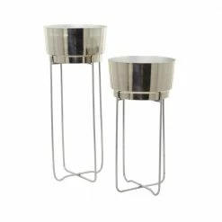 CosmoLiving by Cosmopolitan Cosmo Living by Cosmopolitan 31 in. x 12 in. Silver Metal Contemporary Planter ( Set of 2) -Everbilt Sales Store silver cosmoliving by cosmopolitan plant pots 040723 c3 1000