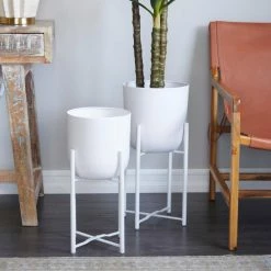 CosmoLiving by Cosmopolitan 22 in. x 20 in. White Metal Modern Planter (Set of 2) -Everbilt Sales Store white cosmoliving by cosmopolitan plant pots 042813 31 1000