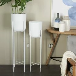 CosmoLiving by Cosmopolitan 47 in. x 40 in. White Metal Modern Planter (Set of 2) -Everbilt Sales Store white cosmoliving by cosmopolitan plant pots 043006 31 1000